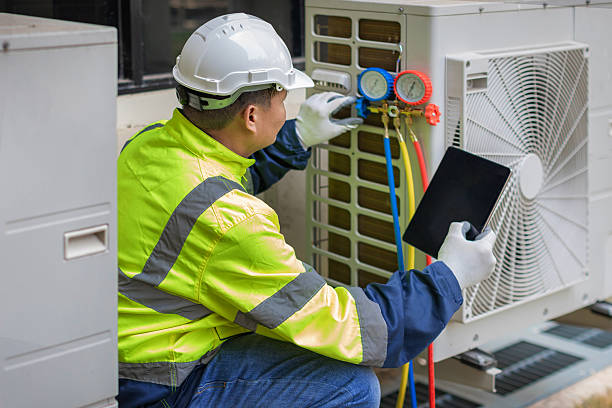 Professional Air Conditioning Repair technician working in Spring Valley, NY